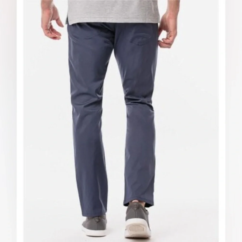Travis Mathew description flat